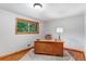 Dedicated office space featuring natural light and hardwood flooring at 2775 Crabapple Rd, Golden, CO 80401