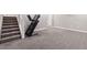 Basement with carpet flooring and a treadmill at 239 W Jamison Ct, Littleton, CO 80120