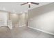 Upstairs landing featuring white railing and carpeted floors at 239 W Jamison Ct, Littleton, CO 80120