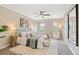 Spacious bedroom with decorative wall art and a large area rug at 239 W Jamison Ct, Littleton, CO 80120