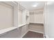 Walk-in closet with shelving, and carpeted floors at 239 W Jamison Ct, Littleton, CO 80120