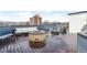 Spacious roof deck with comfortable seating and outdoor kitchen, perfect for entertaining at 336 E 1St Ave # 209, Denver, CO 80203