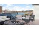Cozy roof deck with a fire pit and comfortable chairs to enjoy a relaxing atmosphere at 336 E 1St Ave # 209, Denver, CO 80203