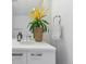 Bathroom boasts decorative flowers on the counter, with silver hardware at 55 W 12Th Ave # 512, Denver, CO 80204