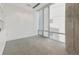 Sunlit bedroom featuring carpet floors, neutral color palette, and a view of the outdoors at 55 W 12Th Ave # 512, Denver, CO 80204