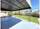 Covered patio overlooking expansive lawn at 2274 S Newton St, Denver, CO 80219