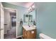 The en-suite bathroom features neutral walls, a vanity, and a toilet at 2900 Purcell St # I4, Brighton, CO 80601