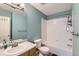 Bright bathroom with a tub/shower combo and vanity with lots of light at 2900 Purcell St # I4, Brighton, CO 80601