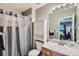 Cozy bathroom featuring a shower/tub combo, cabinet storage, and neutral finishes at 2900 Purcell St # I4, Brighton, CO 80601