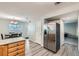 Spacious kitchen featuring stainless steel appliances, counter space and view to dining and living spaces at 2900 Purcell St # I4, Brighton, CO 80601