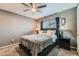 Comfortable primary bedroom featuring a ceiling fan, plush carpet, and decor at 2900 Purcell St # I4, Brighton, CO 80601