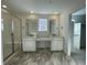 Modern bathroom with dual vanities, glass shower, and stylish tile flooring at 586 Nightsky St, Erie, CO 80516