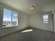 Bedroom with windows offering plentiful light at 586 Nightsky St, Erie, CO 80516