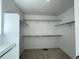 Large walk-in closet with ample shelving and storage space at 586 Nightsky St, Erie, CO 80516