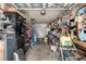 Garage with ample storage shelving and workbench at 16357 E Wyoming Dr, Aurora, CO 80017