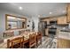 Kitchen with stainless steel appliances and wood cabinets at 16357 E Wyoming Dr, Aurora, CO 80017