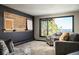 Sitting area featuring armchairs, a view, and a work area at 610 Meadow View Dr, Evergreen, CO 80439