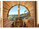 Beautiful wood sauna with mountain views, wooden benches and accessories, providing a relaxing and scenic experience at 610 Meadow View Dr, Evergreen, CO 80439