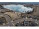 An aerial shot showcasing the lake in the distance at 7484 W Atlantic Ln, Denver, CO 80227