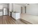 Open-concept kitchen with stainless steel appliances and a view to the living room at 869 Sawdust Dr, Brighton, CO 80601