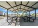 Spacious picnic shelter provides residents with shaded tables and gathering space near the playground at 869 Sawdust Dr, Brighton, CO 80601