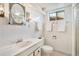 Bathroom featuring a large counter with white tiles and vanity, with towels and updated fixtures at 6581 S Logan St, Centennial, CO 80121