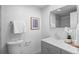 Bright bathroom with modern fixtures, stylish vanity, sleek mirror, and white towels at 700 N Washington St # 502, Denver, CO 80203