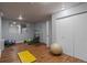 Gym featuring wood floors, full length mirror, and exercise equipment at 700 N Washington St # 502, Denver, CO 80203