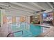 Bright indoor pool area with natural light featuring large windows and serene atmosphere, perfect for year-round enjoyment at 700 N Washington St # 502, Denver, CO 80203