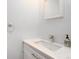 Elegant powder room with a stylish vanity, modern faucet, and decorative details at 8666 E Easter Ave, Centennial, CO 80112