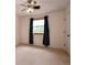 Bright bedroom featuring a ceiling fan and natural light streaming in from the window at 8666 E Easter Ave, Centennial, CO 80112