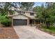 Charming two-story home with brick accents, a two car garage, and well-maintained landscaping at 8666 E Easter Ave, Centennial, CO 80112
