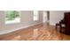 Bright and spacious living room featuring hardwood floors, windows and neutral paint at 8666 E Easter Ave, Centennial, CO 80112