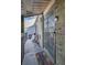 Charming front porch area featuring a security gate and cozy outdoor seating at 3550 S Harlan St # 174, Denver, CO 80235