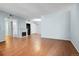Bright living room features a fireplace and hardwood floors, offering a cozy and inviting atmosphere at 3550 S Harlan St # 174, Denver, CO 80235