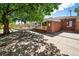 Charming backyard with a hammock, lush tree providing shade, and a cozy outdoor retreat at 7160 Canosa Ct, Westminster, CO 80030