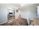 Comfortable bedroom featuring a large closet, a ceiling fan, a work station, and hardwood floors at 7160 Canosa Ct, Westminster, CO 80030
