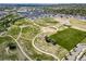 Aerial view of a neighborhood with parks, green spaces, and interconnected walking paths at 7160 Canosa Ct, Westminster, CO 80030
