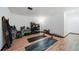 Spacious home gym with fitness equipment, yoga mats, and ample space for exercise at 7160 Canosa Ct, Westminster, CO 80030