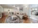 Bright and airy living room with hardwood floors, comfortable sofas, and a ceiling fan at 7160 Canosa Ct, Westminster, CO 80030