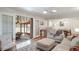 Relaxing sunroom with brick accents, lots of windows, and comfortable seating area at 7160 Canosa Ct, Westminster, CO 80030