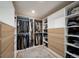 Well-organized walk-in closet featuring custom shelving, drawers, and ample hanging space at 7160 Canosa Ct, Westminster, CO 80030