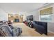 Spacious basement area with a fireplace, large TV, and comfortable seating at 3625 E 128Th Pl, Thornton, CO 80241