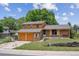 Charming two-story home features a brick facade, two-car garage, and a well-maintained front yard at 3625 E 128Th Pl, Thornton, CO 80241