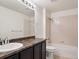 Bathroom with a vanity sink and bathtub with shower at 9084 Ellis Way, Arvada, CO 80005