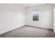Bright, empty bedroom features plush carpeting and great natural light at 9084 Ellis Way, Arvada, CO 80005