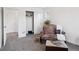 Cozy bedroom with closet, chair, and ottoman at 9084 Ellis Way, Arvada, CO 80005
