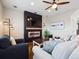 Inviting living room features modern fireplace and stylish decor for cozy relaxation at 9084 Ellis Way, Arvada, CO 80005