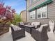 Comfortable outdoor seating area with a stylish table, perfect for relaxing and entertaining at 9084 Ellis Way, Arvada, CO 80005