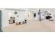 Large basement area featuring a play area, piano, and aerial yoga space at 5962 S Sheridan Way, Littleton, CO 80123